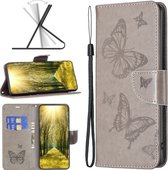 Mobigear Telefoonhoesje geschikt voor Xiaomi Redmi 10 5G Hoesje | Mobigear Butterfly Bookcase Portemonnee | Pasjeshouder voor 3 Pasjes | Telefoonhoesje voor Pinpas / OV Kaart / Rijbewijs - Grijs