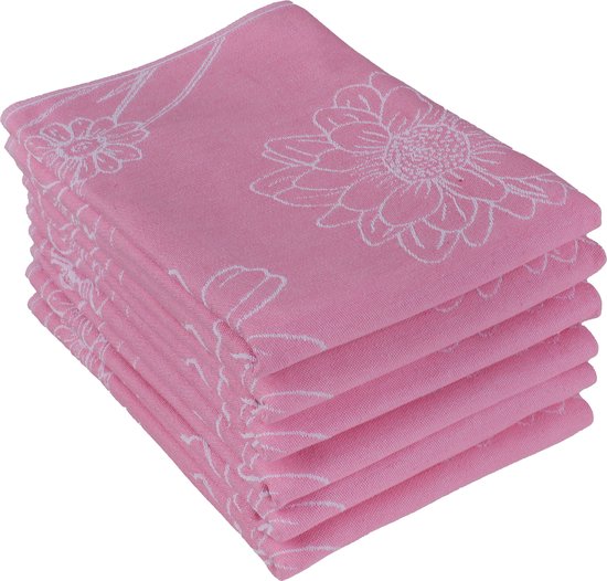 Pile de torchons roses avec un motif floral blanc.