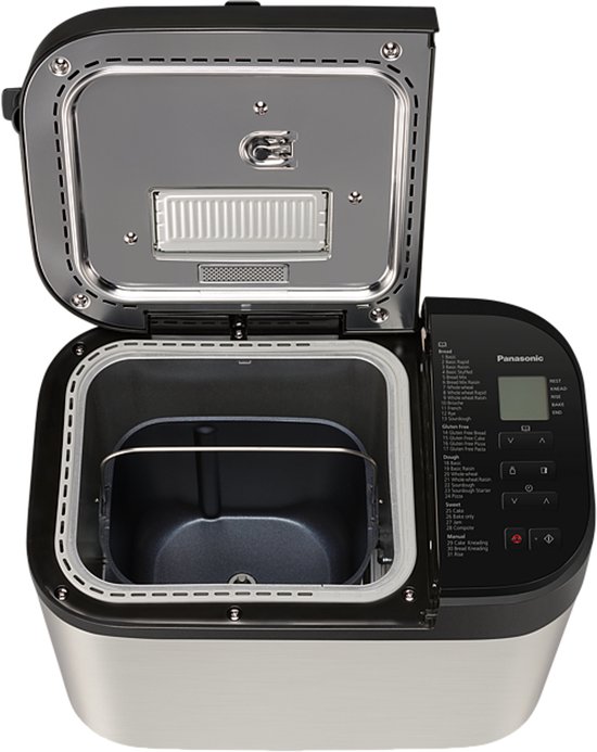 Zilverkleurige broodbakmachine met open deksel, broodvorm en bedieningspaneel.