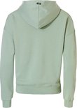 Achterkant van een effen mintgroene hoodie met een klein NOMAD label aan de capuchon.