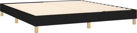 Zwarte bedbodem met houten latten en korte houten poten.