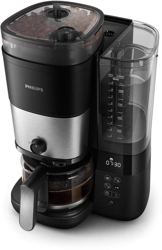 Philips koffiezetapparaat met bonenreservoir, glazen kan en digitale display (07:30).