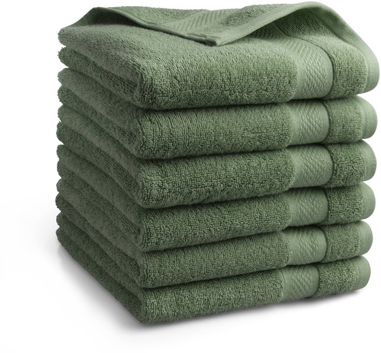 Stapel van 6 groene handdoeken met een gestructureerde rand.
