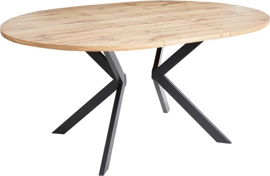 Uitschuifbare ovale eettafel met lichtbruin houten blad en zwart X-vormig onderstel.