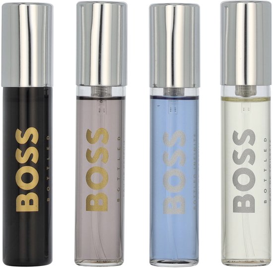 Vier BOSS Bottled mini-parfumflesjes: zwart, lichtgrijs, lichtblauw en crème, met zilveren dopjes.
