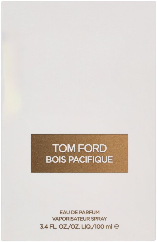 Witte doos met gouden label 'TOM FORD BOIS PACIFIQUE'. Tekst 'EAU DE PARFUM VAPORISATEUR SPRAY 3.4 FL. OZ./OZ. LIQ./100 ml e'.