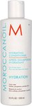 Witte Moroccanoil Hydrating Conditioner fles met oranje M-logo. Tekst in Engels, Frans.