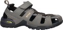 Grijsbruine Teva sandalen met klittenbandsluiting, gele veters en "Teva" logo. Achterkant met open hiel.