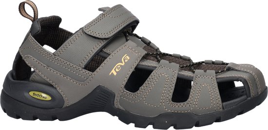 Grijsbruine Teva sandalen met klittenbandsluiting, gele veters en "Teva" logo. Achterkant met open hiel.