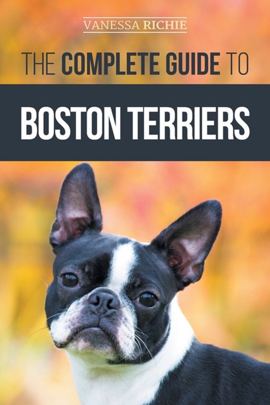De kaft van "The Complete Guide to Boston Terriers" met een Boston Terrier hoofd. Achtergrond oranje herfstbladeren.