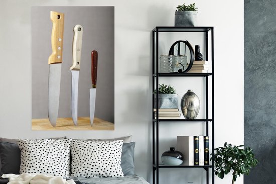 Poster Couteaux dans une planche à découper 80x120 cm - Tirage photo sur Poster (décoration murale salon / chambre)