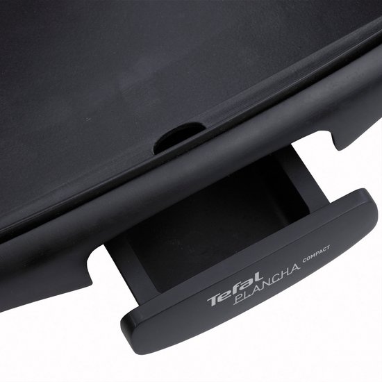 Close-up van de Tefal Plancha Compact grillplaat met opvangbakje.