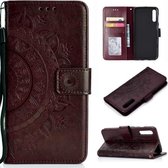 Voor Sony Xperia 10 II Totem Bloem Reliëf Horizontale Flip TPU + PU Leren Case met Houder & Kaartsleuven & Portemonnee (Bruin)