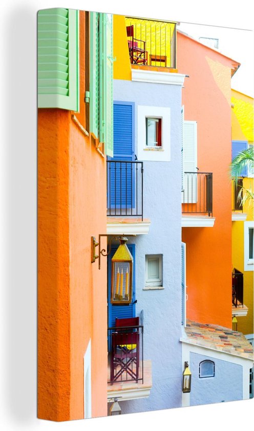 Canvas Schilderij Gekleurde huizen Saint Tropez, Zuid-Frankrijk - 40x60 cm - Wanddecoratie