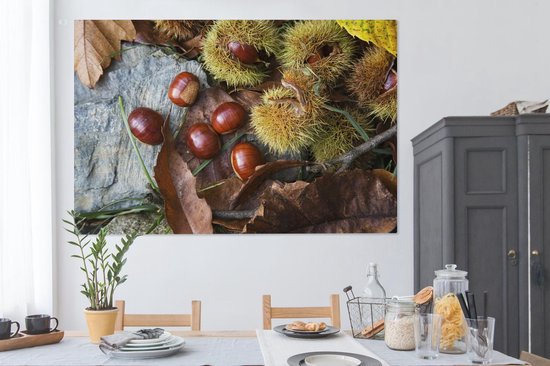 Canvas schilderij 150x100 cm - Wanddecoratie Zoete tamme kastanjes liggend op de herfstgrond - Muurdecoratie woonkamer - Slaapkamer decoratie - Kamer accessoires - Schilderijen