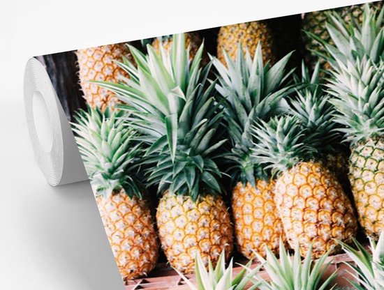 Ananas sur un marché au Mexique papier peint photo en vinyle largeur 600 cm x hauteur 400 cm - Tirage photo sur papier peint (disponible en 7 tailles)