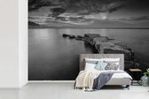 Behang - Fotobehang Stenen pad naar de zee - Breedte 420 cm x hoogte 280 cm