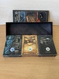 Achterkant van de drie IVANKART speelkaarten-decks met genummerde echtheidszegels, voor de collector box.