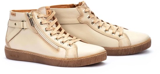 Crèmekleurige Pikolinos sneakers met veter en rits, met bruine zolen.
