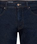 Donkerblauwe Petrol Industries Starling jeans met koperkleurige knoop, rits en bruine stiksels.