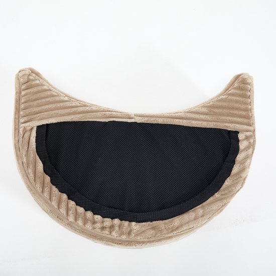 Onderkant van een bruine corduroy hocker met een gebogen vorm en een zwarte antislip onderlaag.