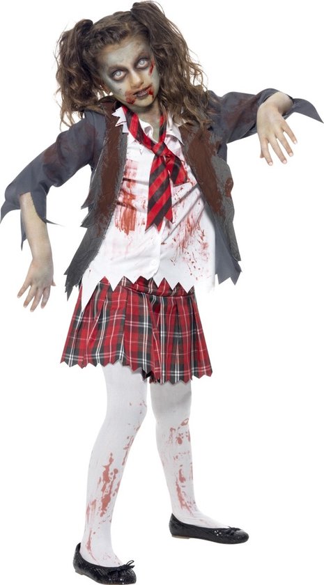 Enfant en costume de zombie écolière avec chemisier blanc taché de sang, jupe à carreaux, cravate et veste grise déchirée.