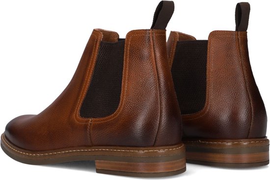 Achteraanzicht van bruine Mazzeltov chelsea boots met een lage hak en bruine aantreklussen.