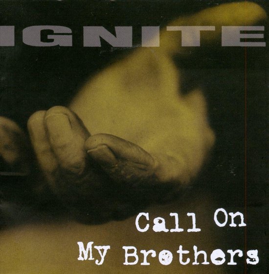 Albumhoes met de tekst IGNITE en Call On My Brothers op een wazige afbeelding van een hand.