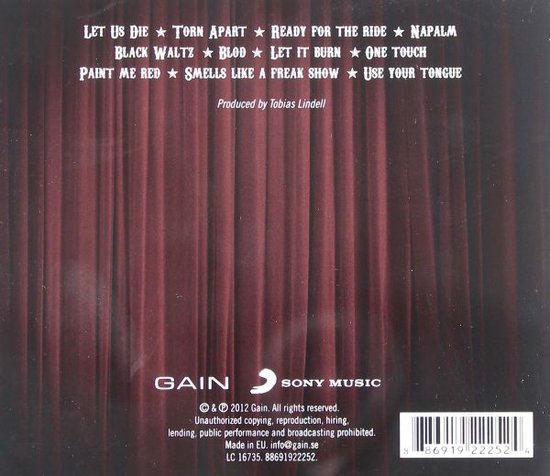 Achterkant cd-hoes met rode gordijnen en tracklist 'Let Us Die', 'Torn Apart', 'Ready for the Ride', 'Napalm', 'Black Waltz', 'Blood', 'Let It Burn', 'One Touch', 'Paint Me Red', 'Smells Like a Freak Show', 'Use Your Tongue'.