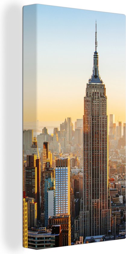 Canvas Schilderij Zonsondergang skyline van New York met het Empire State Building - 40x80 cm - Wanddecoratie