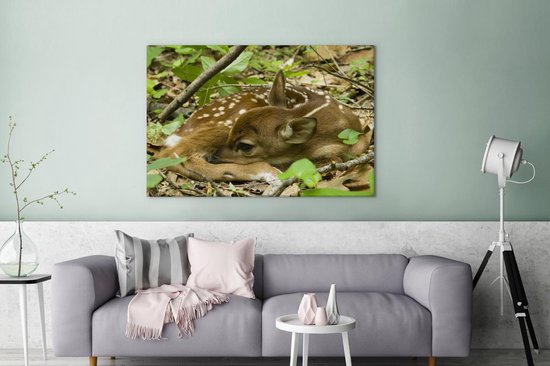 Canvas schilderij 140x90 cm - Wanddecoratie Hert - Struiken - Slapen - Muurdecoratie woonkamer - Slaapkamer decoratie - Kamer accessoires - Schilderijen op canvas