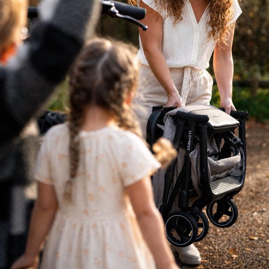 BuggyFix - neem compact buggy mee op Urban Arrow bakfiets met Essential V2 bagagedrager — afbeelding 2