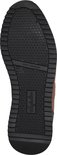 Zool van bruine herensneaker met 'Shock Absorber' en 'Australian' logo.