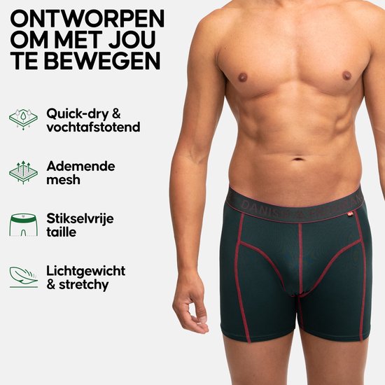 Man met donkergroene sportboxer met rode stiksels. Tekst: 'ONTWORPEN OM MET JOU TE BEWEGEN'.