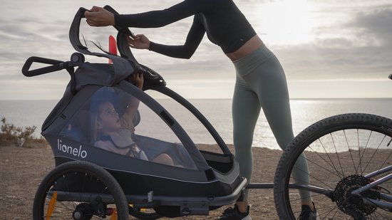 Lionelo Fietskar 2in1 - Fiets aanhanger + Kinderwagen voor 2 Kinderen - 360° Voorwiel - 60L Bagageruimte - Full Vering - 5-Punts Gordels - Grote Luchtbanden - UPF50+ & Waterafstotend - Kinderfietskar & Buggy Inklapbaar - Wandelwagen - Tot 2x22 kg van LIONELO — afbeelding 5