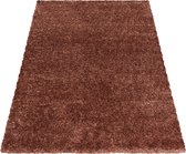 Hoogpolig tapijt met fijne haartjes in de kleur koper