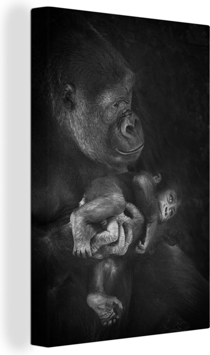 Canvas Schilderij Een gorilla met een baby aap in haar handen in zwart-wit - 40x60 cm - Wanddecoratie