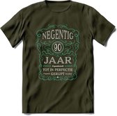 90 Jaar Legendarisch Gerijpt T-Shirt | Aqua - Grijs | Grappig Verjaardag en Feest Cadeau Shirt | Dames - Heren - Unisex | Tshirt Kleding Kado | - Leger Groen - XL