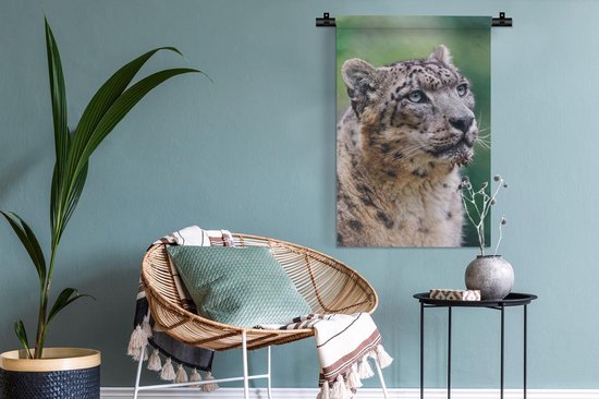 Wandkleed Sneeuwluipaard - Sneeuwluipaard die omhoog kijkt Wandkleed katoen 60x90 cm - Wandtapijt met foto