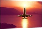 Dibond - Opstijgend Vliegtuig met Oranje Horizon - 150x100cm Foto op Aluminium (Met Ophangsysteem)