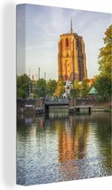 Canvas schilderij 90x140 cm - Wanddecoratie Friesland - Leeuwarden - Toren - Muurdecoratie woonkamer - Slaapkamer decoratie - Kamer accessoires - Schilderijen