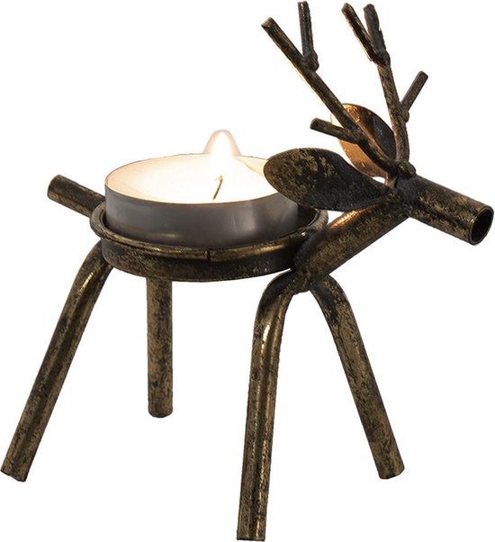 Bougeoir bronze en forme de cerf avec une bougie allumée.
