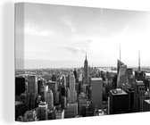 Canvas schilderij 150x100 cm - Wanddecoratie Skyline van New York tijdens een zonsondergang - zwart wit - Muurdecoratie woonkamer - Slaapkamer decoratie - Kamer accessoires - Schilderijen