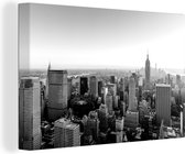 Canvas Schilderij Zonsopkomst bij de skyline van New York - zwart wit - 120x80 cm - Wanddecoratie