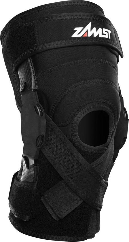 Zamst ZK-X kniebrace, zwart, met banden en scharnierende steunen.