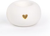Witte ronde urn met een gouden hartje.