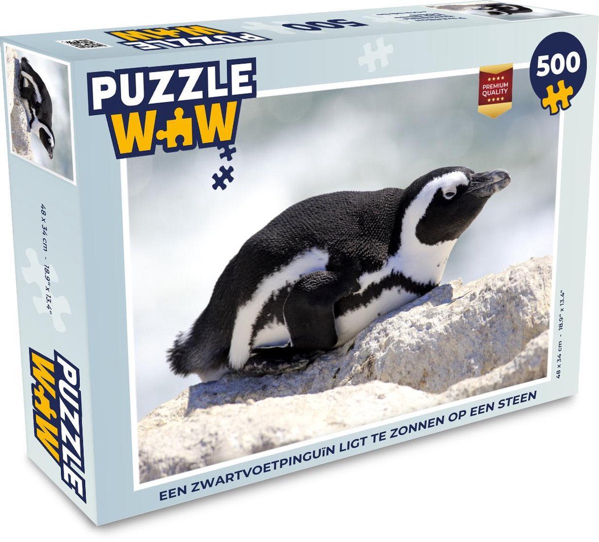 Afbeelding van product Puzzel 500 stukjes Zwartvoetpinguïn - Een Zwartvoetpinguïn ligt te zonnen op een steen - PuzzleWow heeft +100000 puzzels