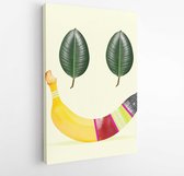 Nature's smile. Banana and green leaves as a human emotion of happiness on yellow background. Negative space. Modern design. Contemporary art. Creative conceptual and colorful coll