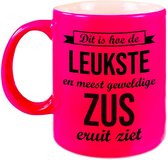 Leukste en meest geweldige zus cadeau koffiemok / theebeker neon roze 330 ml