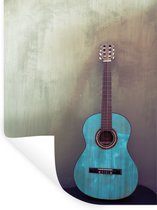 Muurstickers - Sticker Folie - Gekleurde akoestische gitaar in een kamer met een betonnen muur - 60x80 cm - Plakfolie - Muurstickers Kinderkamer - Zelfklevend Behang - Zelfklevend behangpapier - Stickerfolie